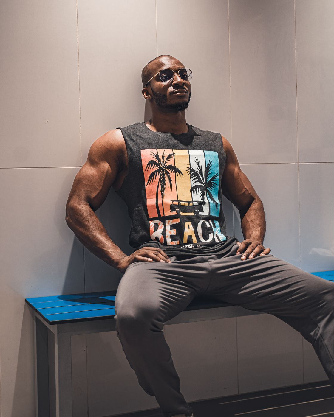 Azhar Garba sitting in the gym
